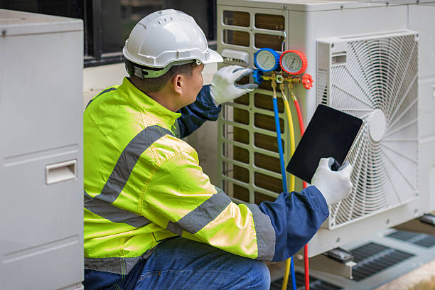 Professional Hvac technician working in Clinton, MA